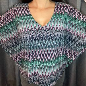 JLO sheer multi colored bat wing blouse